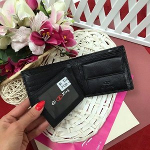 Мужской кошелек Qi Xing двойного сложения из натуральной кожи чёрного цвета.
