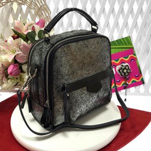 Роскошная сумка La_Cuture из натуральной кожи с лазерной обработкой чёрного цвета.