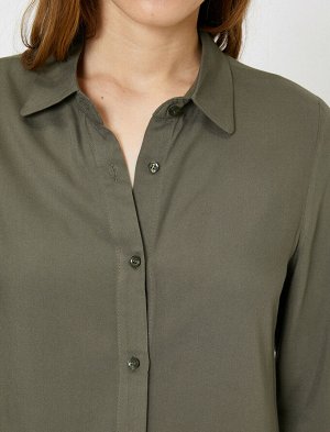 рубашка Материал: %100 вискозыПараметры модели: рост: 176 cm, грудь: 84, талия: 60, бедра: 90 Надет размер: 36