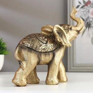 Сувенир полистоун "Золотистый слонёнок с пальмовыми листьями на попоне" 17.5х7х19 см