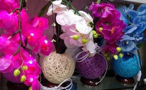 Орхидея Искусственный цветок «Орхидея » со встроенными светодиодами прекрасно дополнит интерьер в вашем доме. Днем экзотическая орхидея будет служить превосходным украшением вашего интерьера, а в вече