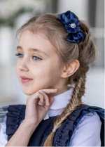 Стильный и удобный ободок, декорированный бантом