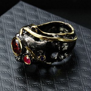 Кольцо 'Черное золото' со вставкой из красного циркона