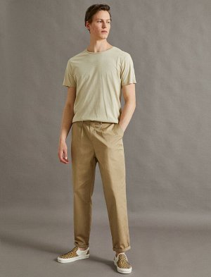 брюки Материал: %100  Хлопок Параметры модели: рост: 188 cm, грудь: 94, талия: 77, бедра: 0  Надет размер: 42
