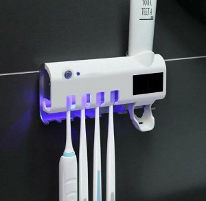 Диспенсер для зубной пасты и щеток с УФ-стерилизатором