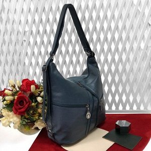 Функциональная сумка-рюкзак Karmen из качественной матовой эко-кожи дымчато-голубого цвета.