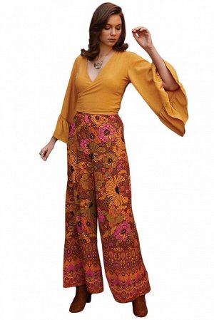 Оранжевые брюки-палаццо с ярким цветочным узором