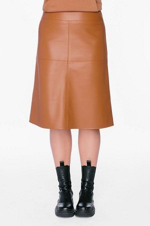 Юбка Молодежная модель юбки А-силуэта из популяпной эко-кожи  цвета "кэмэл" на подкладке. Юбка выполнена без пояса, на фигурной кокетке, сзади металлическая молния. Длина 66 см. Размер модели на фото 