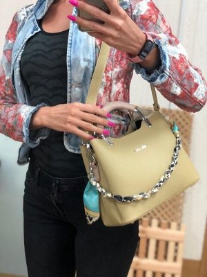 Дизайнерская сумочка Telyviv с ремнем через плечо из матовой эко-кожи лаймового цвета.