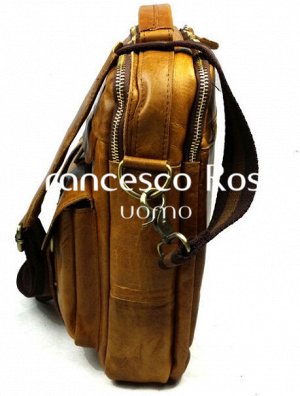 Andrea Сумка-портфель из натуральной кожи Размер сумки: длина – 28 см, ширина – 9 см, высота – 28см. Одна кожаная ручка и длинный регулирующийся ремень для ношения на плече. Данная модель сумки подойд