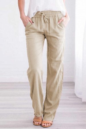 Бежевые штаны с эластичными поясом на шнурке и карманами