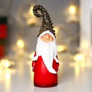 Сувенир полистоун "Дед мороз в шапке-шишке, с подарком" 14,5х5,7х3,6 см