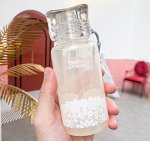 Бутылочка для воды в виде флакончика духов, цвет абрикосово-желтый