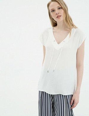 Майка экрю Material:

100% Polyester

Model Size Information:

Height: 177 cm, Breast: 86, Waist: 60, Hip: 89
Model Size: 36
