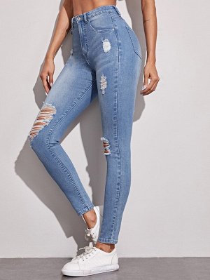Рваные облегающие джинсы