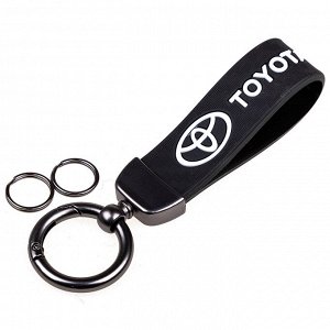 Брелок Брелок силикон/металлический SW с кольцом Toyota - Стильный, современный брелок для ключей, выполненный из прочного силикона с металлическим кольцом. Размеры образца: Общая длина-125 мм Ширина-
