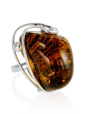 Крупное кольцо с натуральным искрящимся янтарём необычного оттенка «Риальто»