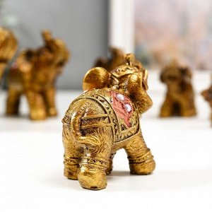 Сувенир полистоун "Семь слонов в красной попоне с жемчугом" h=10,3;9;7,6;7;6,2;5,5;4,2 см