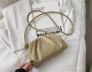 Женская сумочка округлой формы