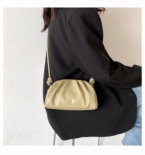 Женская сумочка округлой формы