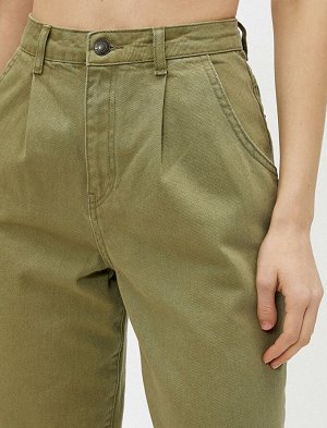 брюки Материал: %100 Хлопок Параметры модели: рост: 175 cm, грудь: 84, талия: 60, бедра: 89 Надет размер: 36