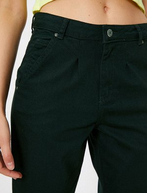 брюки Материал: %100 Хлопок Параметры модели: рост: 178 cm, грудь: 86, талия: 60, бедра: 90 Надет размер: 36