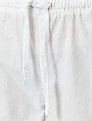 брюки Материал: %100 Poliamid Параметры модели: рост: 180 cm, грудь: 83, талия: 60, бедра: 88 Надет размер: 36