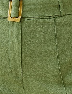 брюки Материал: %55  льнян, %45 Rayon Параметры модели: рост: 178 cm, грудь: 82, талия: 60, бедра: 90 Надет размер: 36