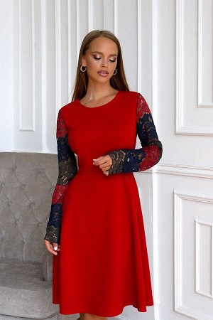 Платье Коктейльное платье с кружевными рукавами-отличный пример изысканности стиля! Сочетание красного и темных цветов выглядит очень броско и ярко. Фасон достаточно прост и сдержан. От отрезной талии