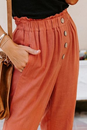 Оранжевые легкие брюки с застежкой на пуговицах