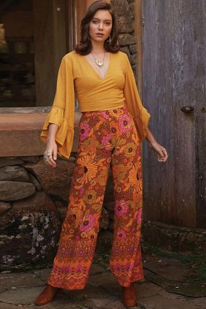 Оранжевые брюки-палаццо с ярким цветочным узором