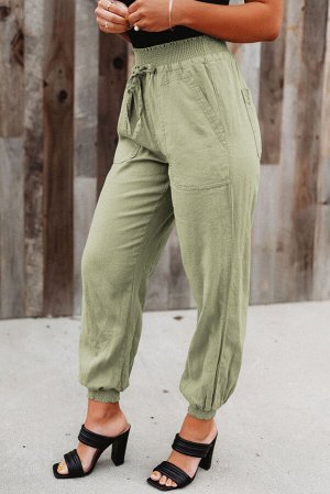 Зеленые джоггеры с эластичной талией на шнуровке и карманами