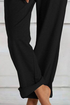 Черные штаны свободного кроя с эластичной талией на шнуровке и карманами