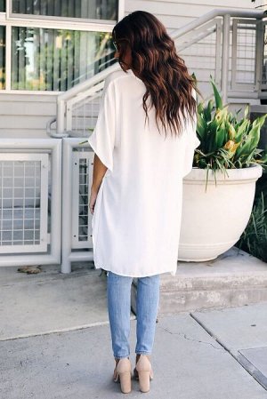 Белая блуза-туника со сборками по бокам и разновеликим подолом