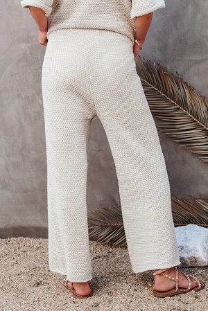 Бежевый вязаный комплект: брюки свободного кроя + футболка на пуговицах
