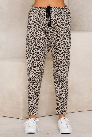 Бежево-леопардовые зауженные штаны с поясом на шнурке