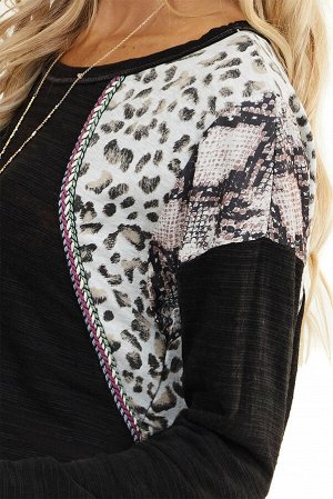 Черный пуловер-свитшот с белыми леопардовыми вставками на плечах