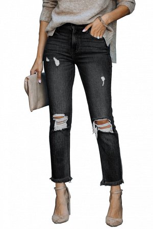 Черные рваные джинсы с застежкой на пуговицах и необработанными краями