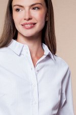 Базовая блузка из ткани в плетеную полоску.