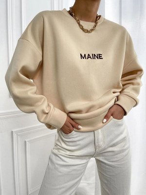 Пуловер с текстовой вышивкой