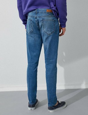 джинсы Материал: Параметры модели: рост: 189 cm, грудь: 99, талия: 75, бедра: 99 Надет размер: 32/34