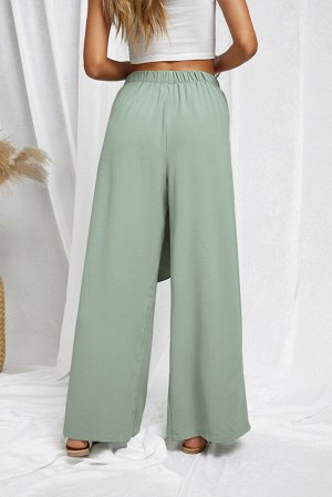 Зеленые широкие брюки с узлом на талии