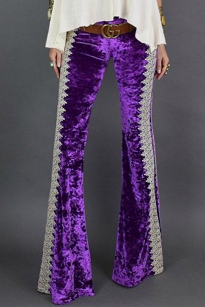 Фиолетовые вельветовые брюки с кружевными полосами по бокам и клешем от колена