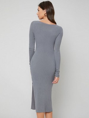 Вязаное платье-свитер с разрезом в рубчик
