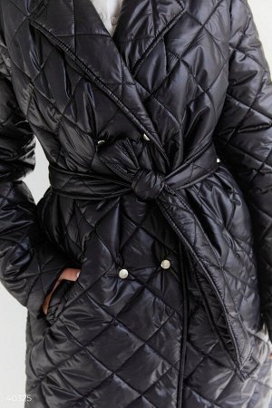 Длинная стеганная куртка черного цвета
