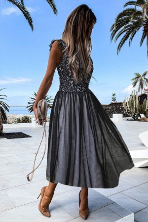 Черное полупрозрачное платье с воротником-стойка и цветочным кружевом