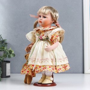 Кукла коллекционная керамика "Иришка в бежево-оранжевом платье с цветами и мишкой" 30 см