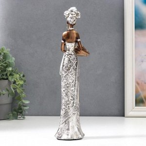 Сувенир полистоун "Африканка в серебр.платье с перламутром с тарелкой фруктов" 32х7х9,5 см