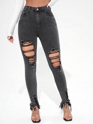 Рваные джинсы с необработанным низом и бахромой