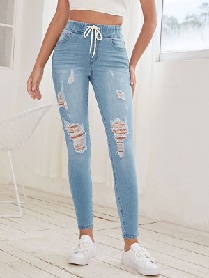 Рваные джинсы-скинни на кулиске
